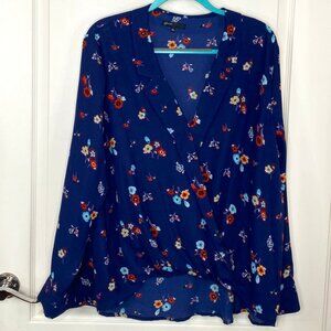 Gibson Blue Floral Print Blouse, cinched in front, longer in back.